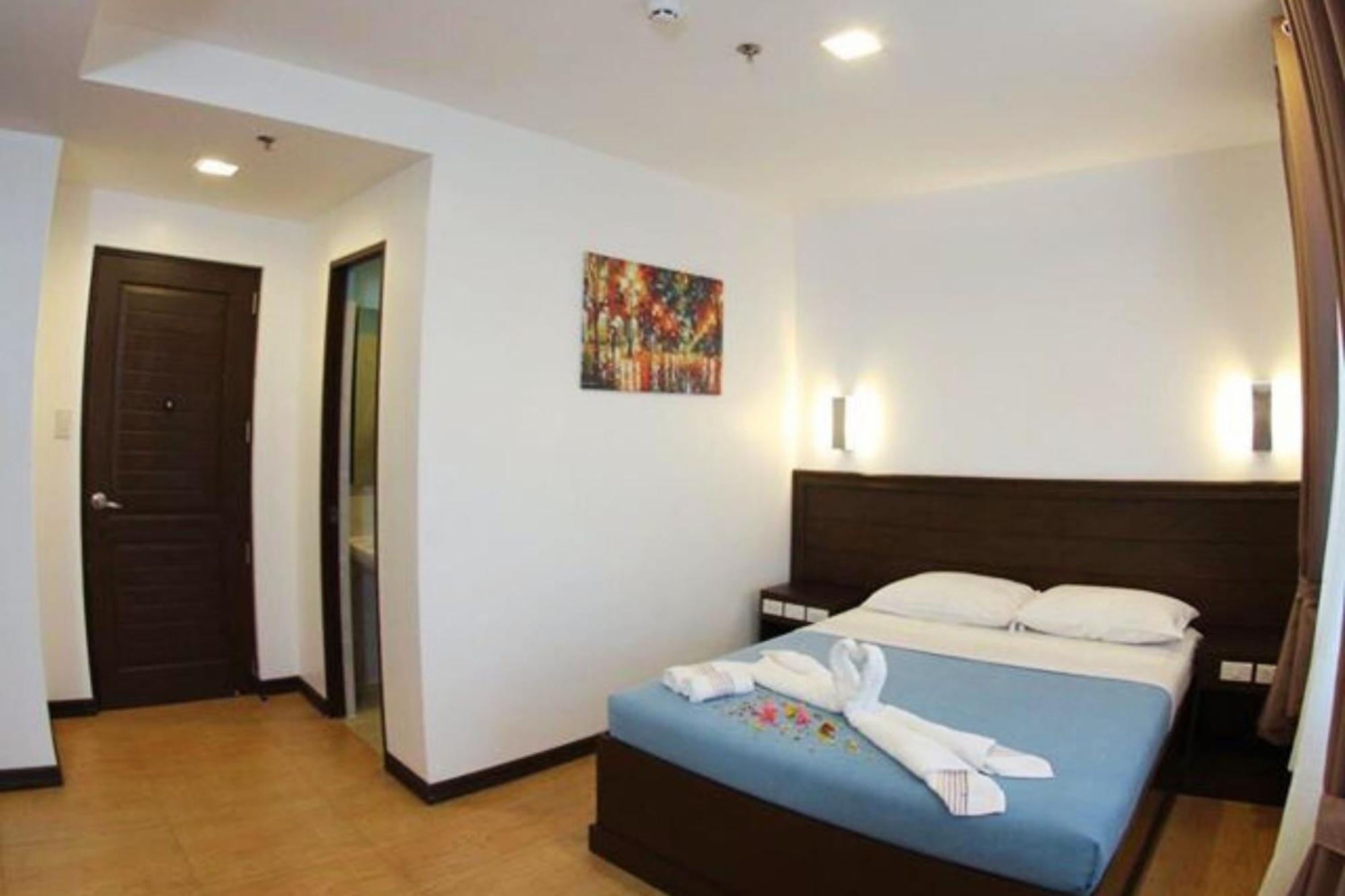 Pearli View Hotel Iloilo Powered By Cocotel Chambre photo